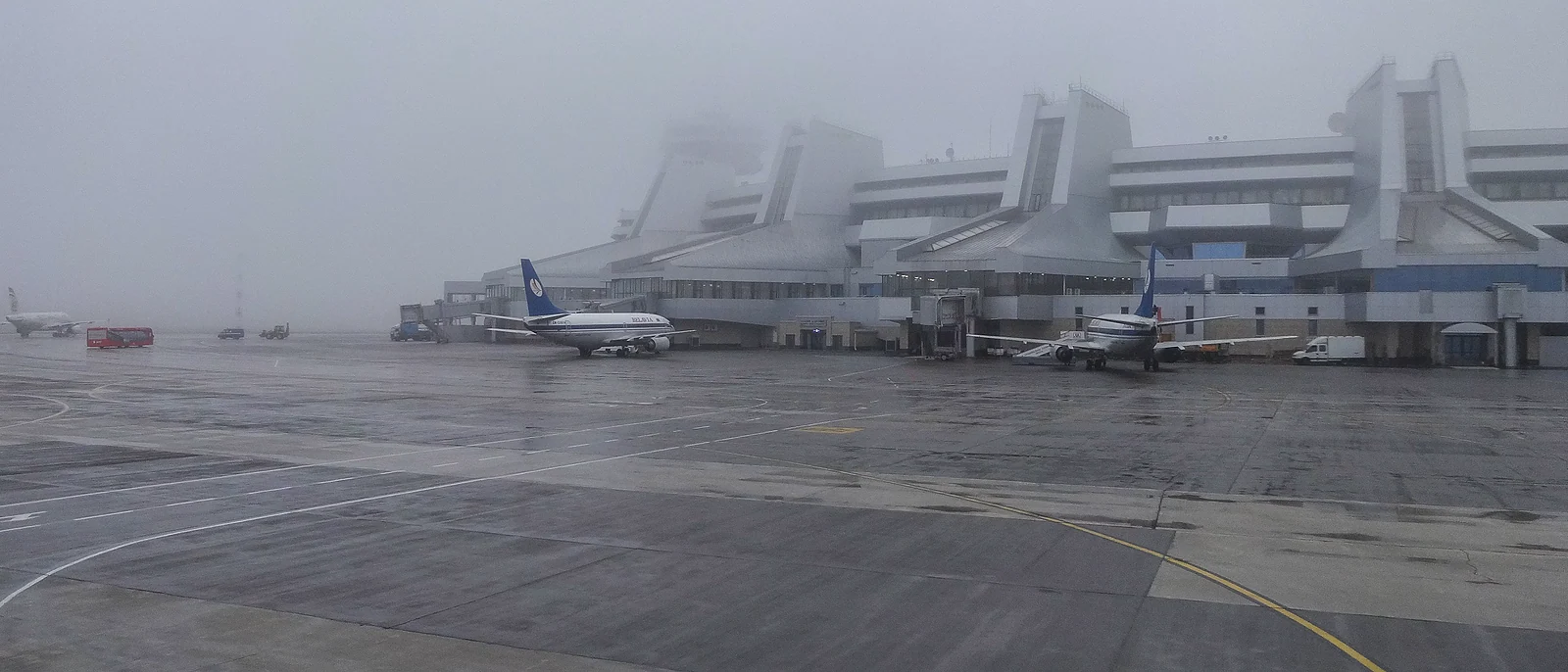 Foggy airport apron during a weather disruption